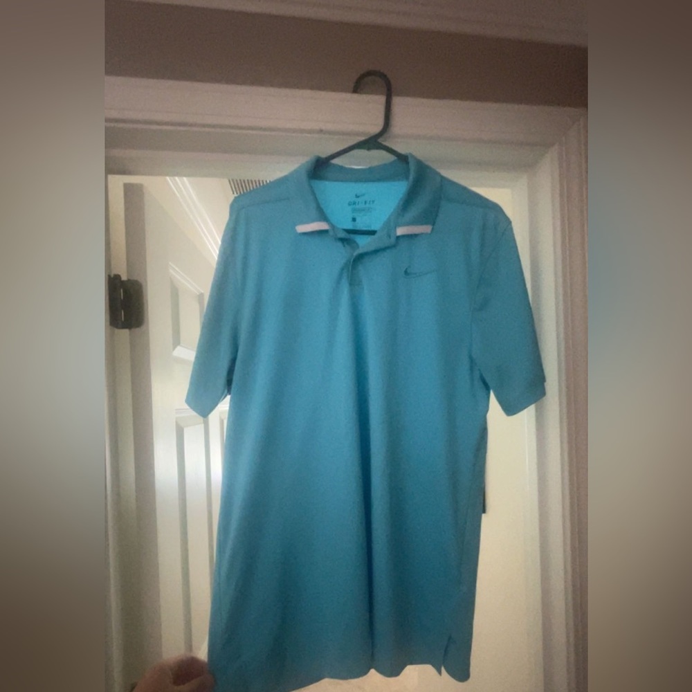Blue Nike dri fit golf shirt